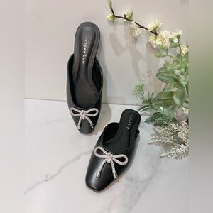 Copper Key Black Mules with Metallic Bow